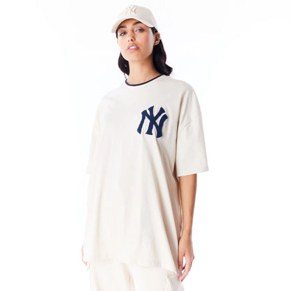 The Male model is wearing New York Yankees World Series Light Beige Drop Shoulder T-Shirt  4