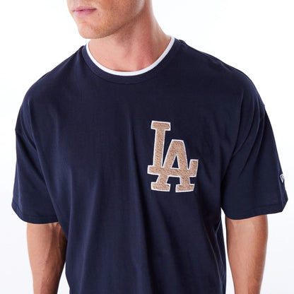 The Male model is wearing LA Dodgers World Series Navy Drop Shoulder T-Shirt  4