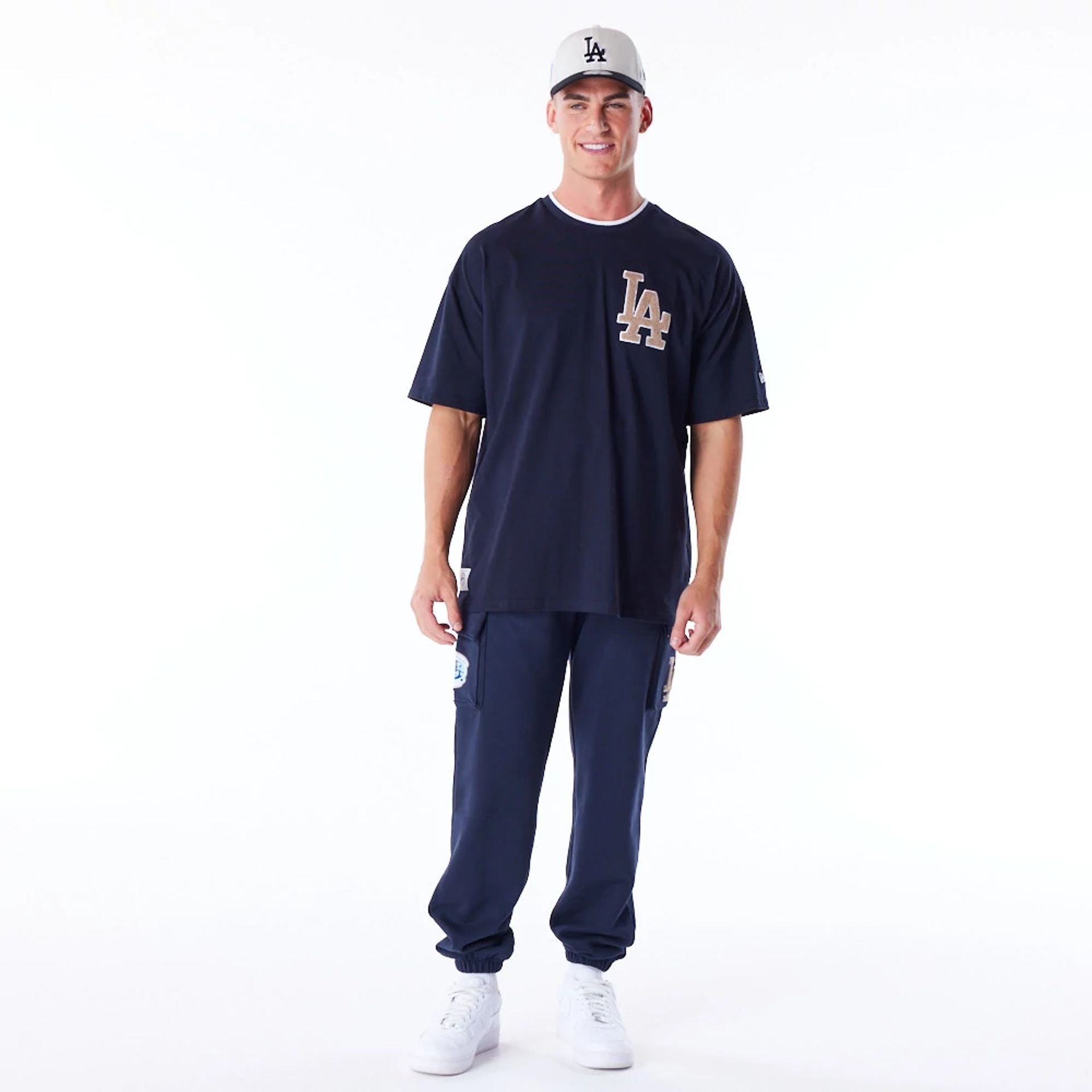 The Male model is wearing LA Dodgers World Series Navy Drop Shoulder T-Shirt  2