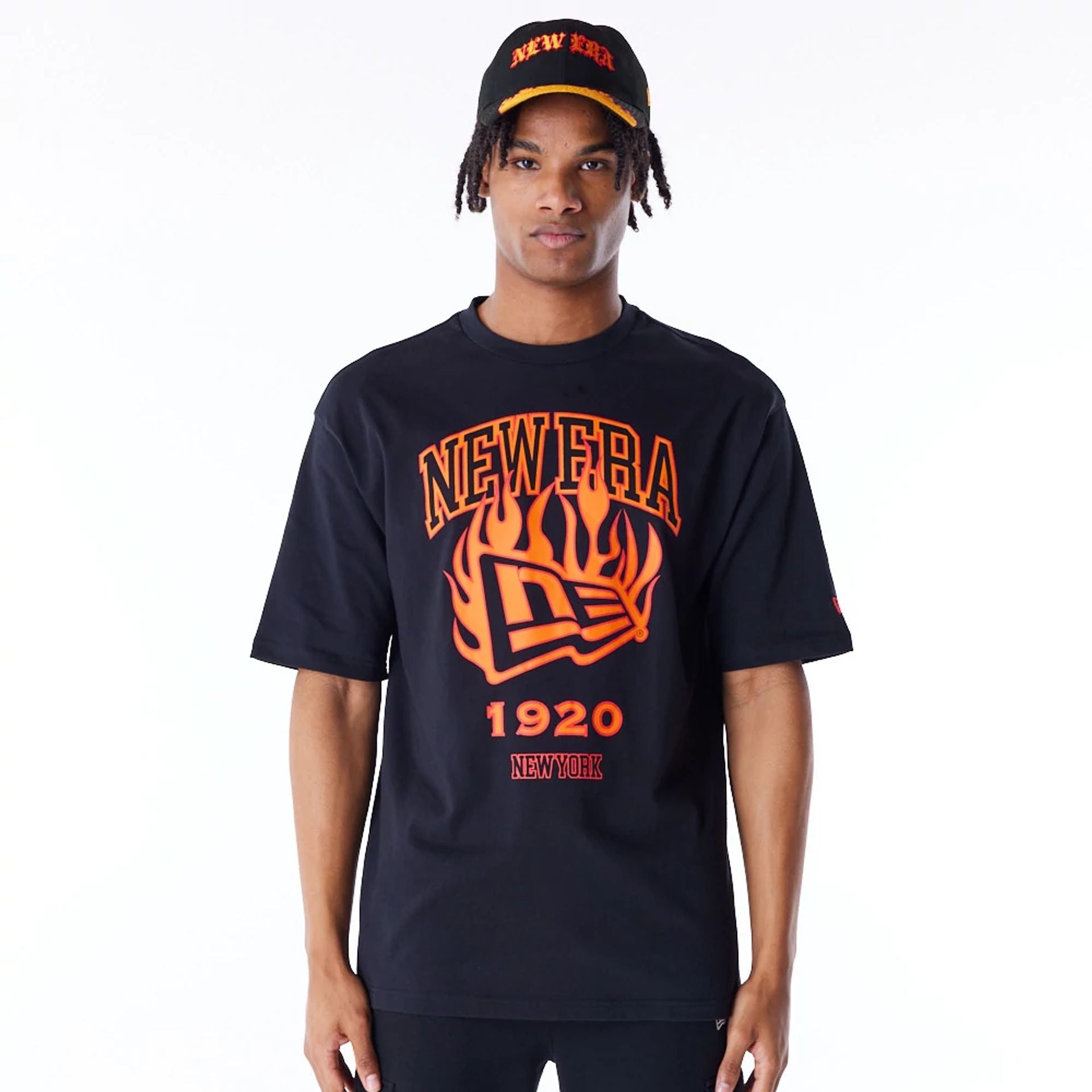 The Male model is wearing New Era Flag Flame Black Oversized T-Shirt 1