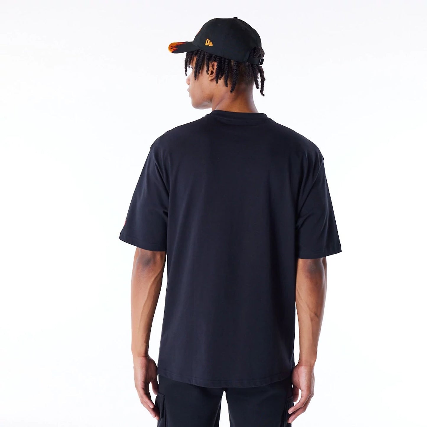 The Male model is wearing New Era Flag Flame Black Oversized T-Shirt 2