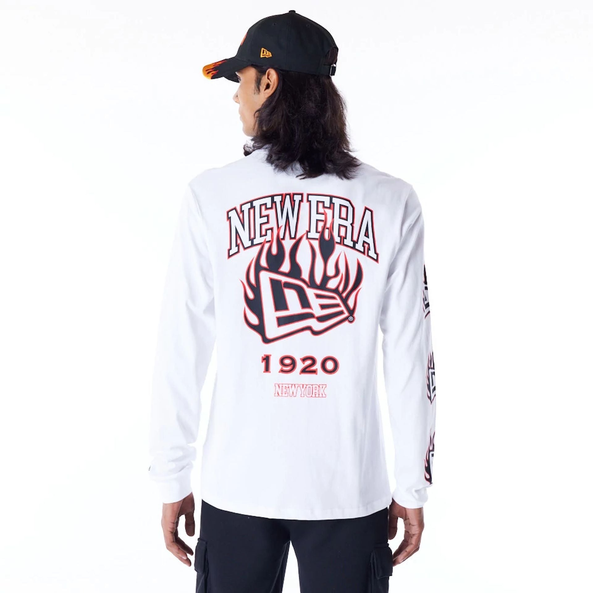 The Male model is wearing New Era Flag Flame White Long Sleeve T-Shirt 7