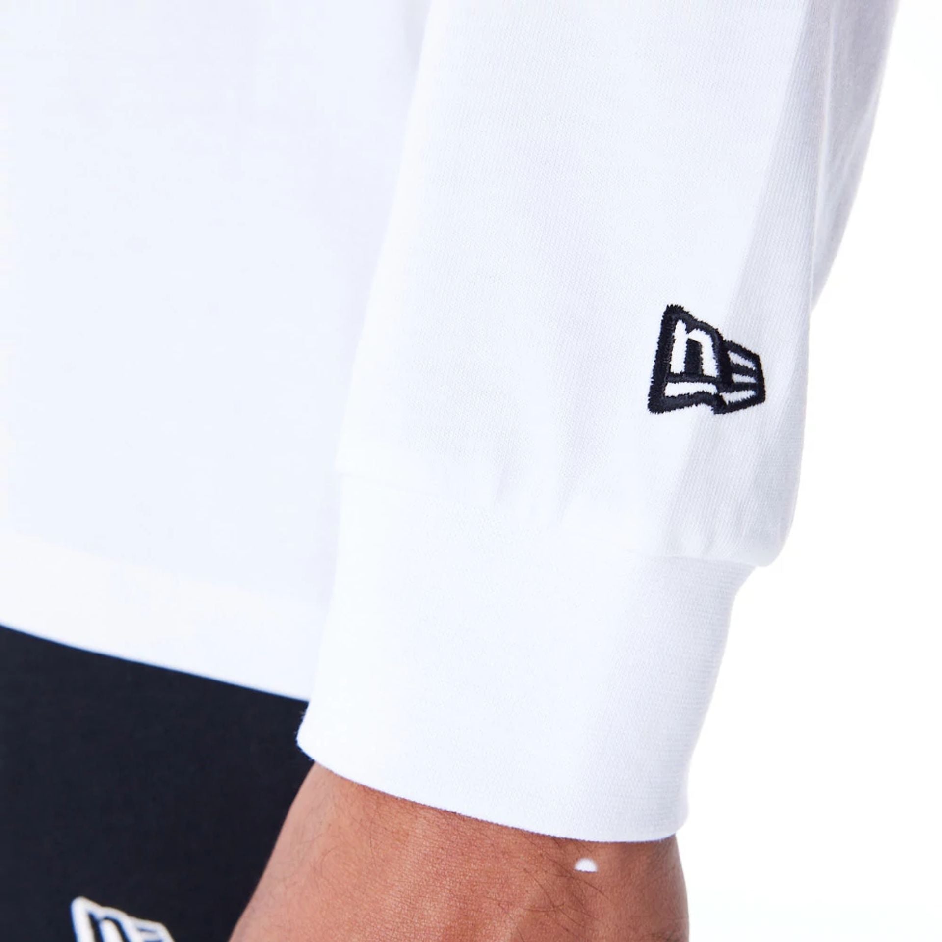 The Male model is wearing New Era Flag Flame White Long Sleeve T-Shirt 8