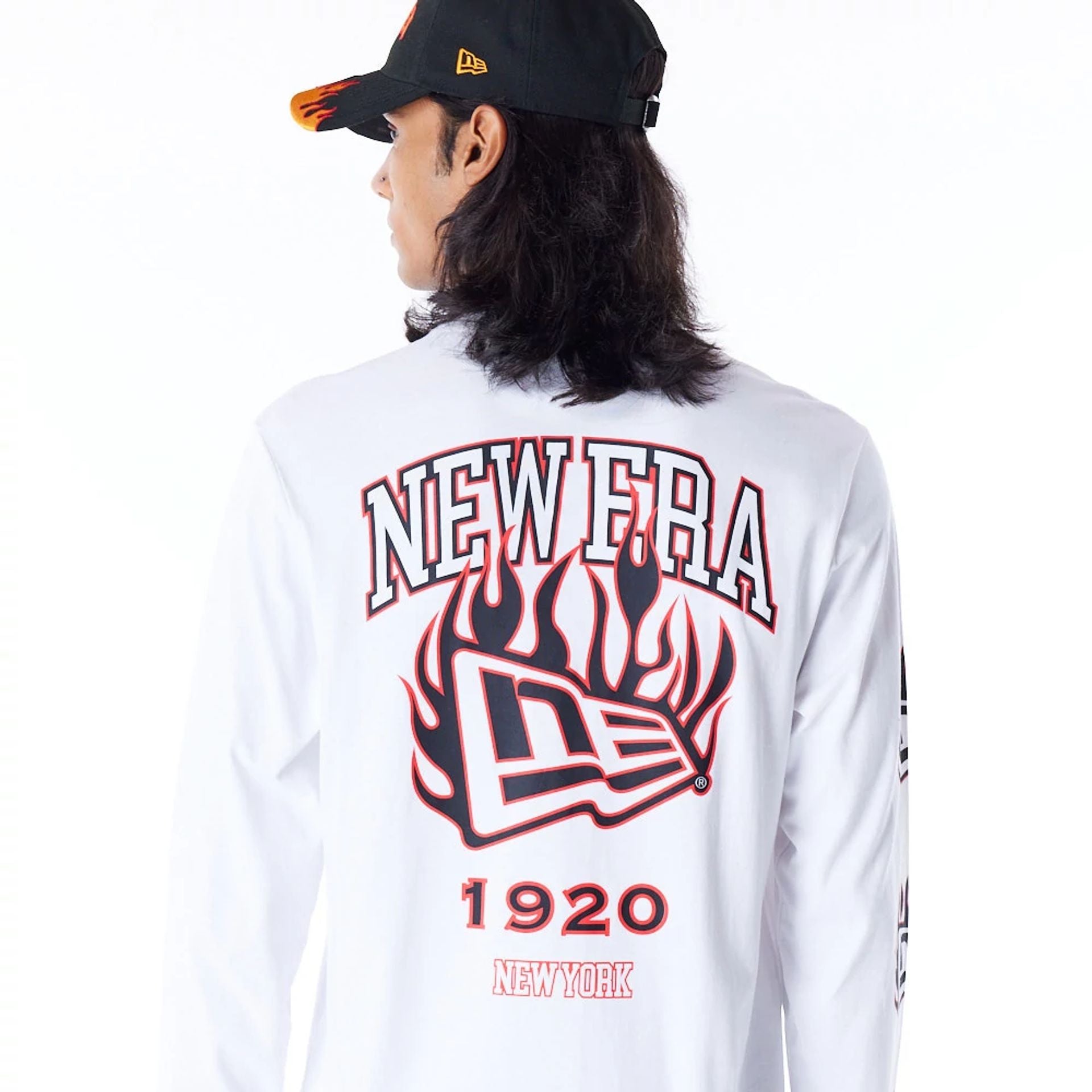 The Male model is wearing New Era Flag Flame White Long Sleeve T-Shirt 4