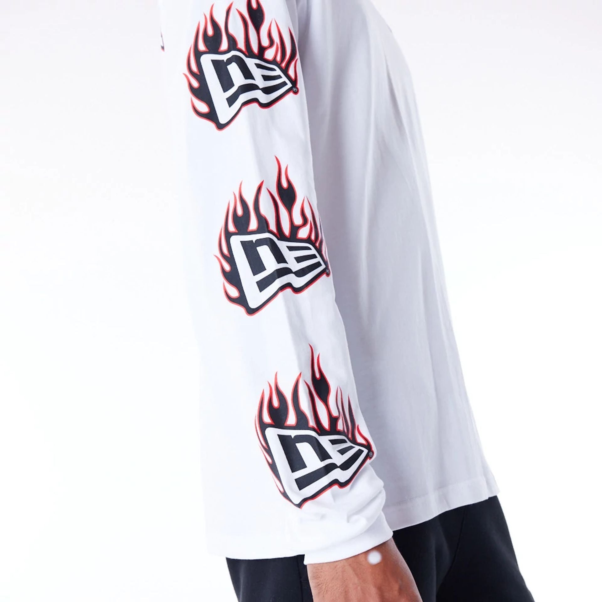 The Male model is wearing New Era Flag Flame White Long Sleeve T-Shirt 6