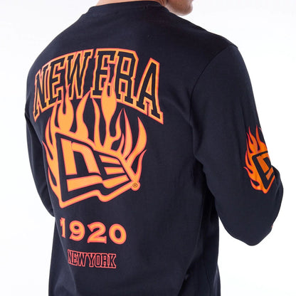 The Male model is wearing New Era Flag Flame Black Long Sleeve T-Shirt 3