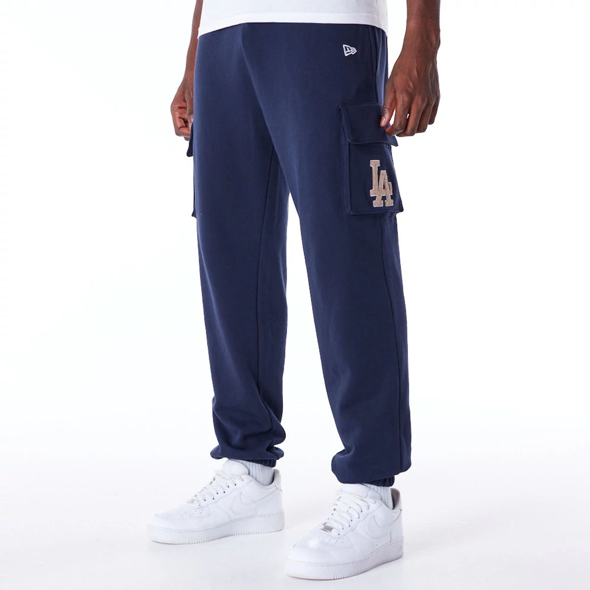 The Male model is wearing LA Dodgers World Series Navy Fleece Cargo Joggers 1