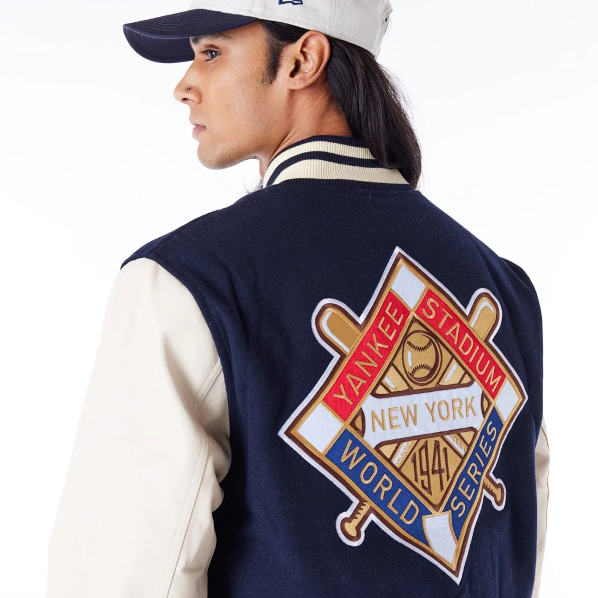 The Male model is wearing New York Yankees MLB Patch Navy Varsity Jacket 2