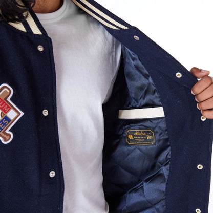 The Male model is wearing New York Yankees MLB Patch Navy Varsity Jacket 3