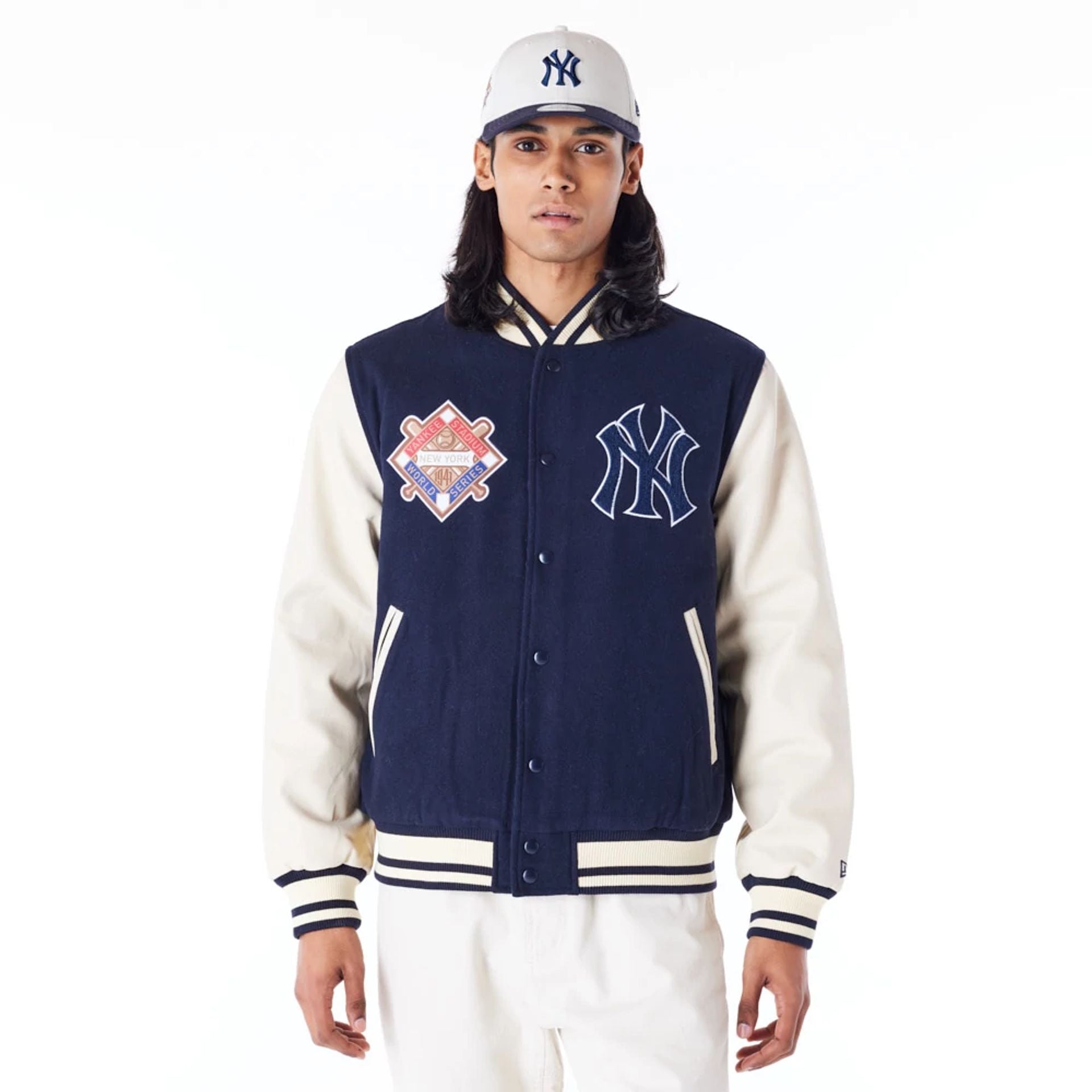 The Male model is wearing New York Yankees MLB Patch Navy Varsity Jacket 1