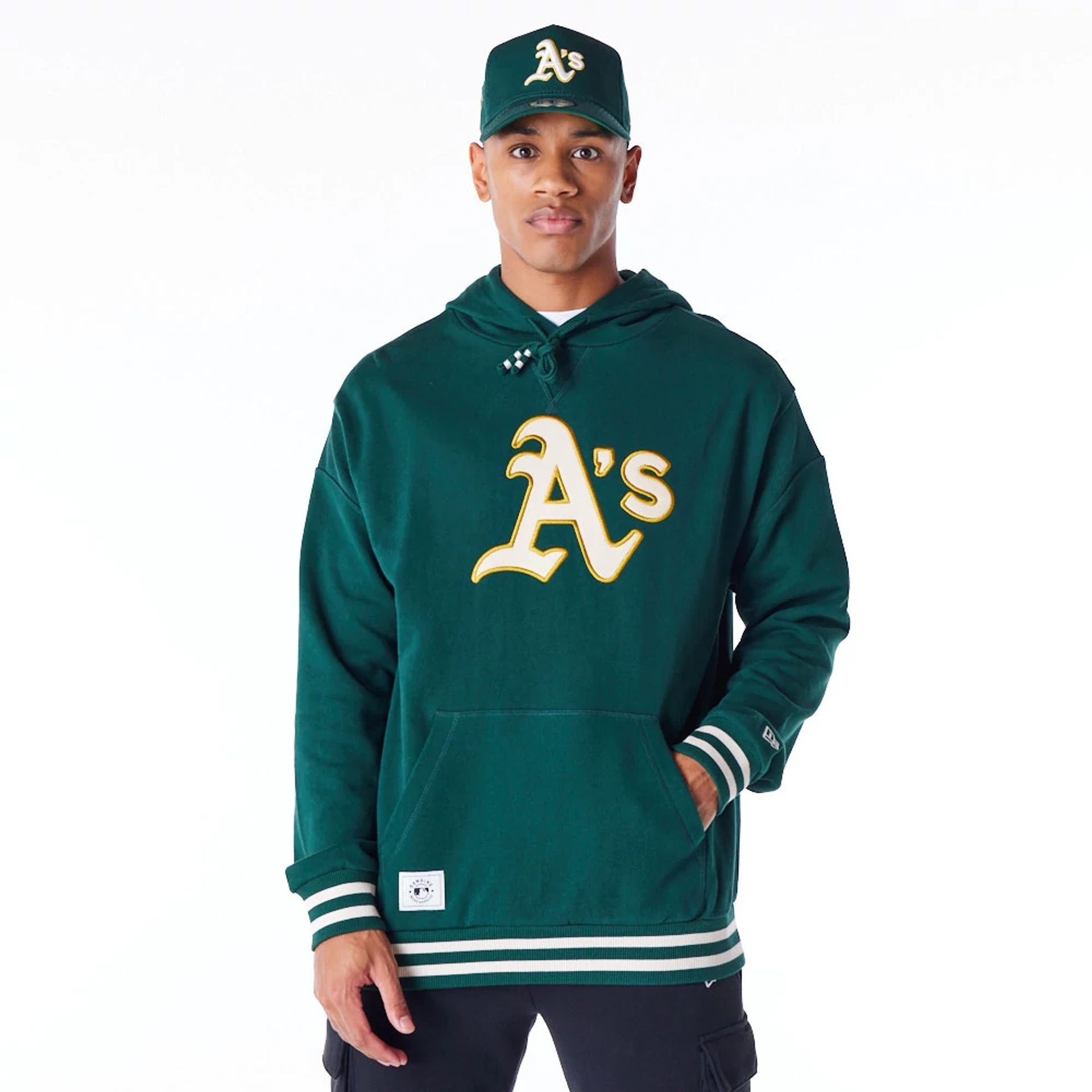 The Male model is wearing Oakland Athletics MLB Rib Infill Dark Green Oversized Pullover Hoodie 9