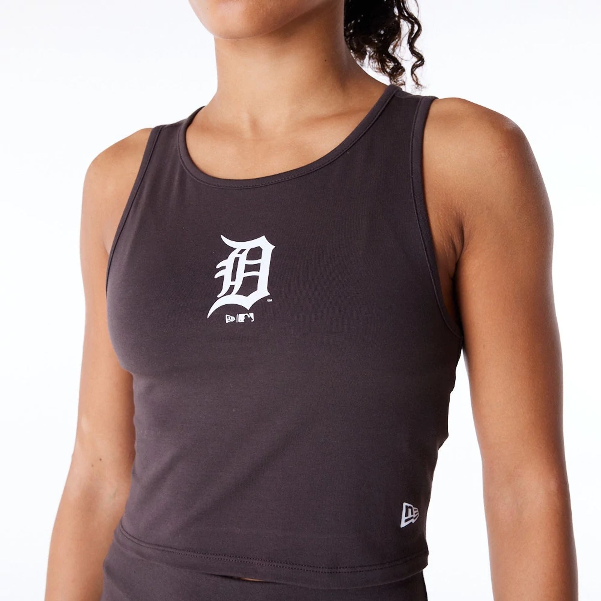 The Female model is wearing Detroit Tigers Womens MLB League Essential Dark Brown Crop Tank Top 7