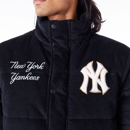 The Male model is wearing New York Yankees MLB Black Cord Puffer Jacket 2