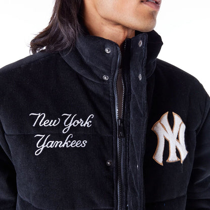 The Male model is wearing New York Yankees MLB Black Cord Puffer Jacket 7