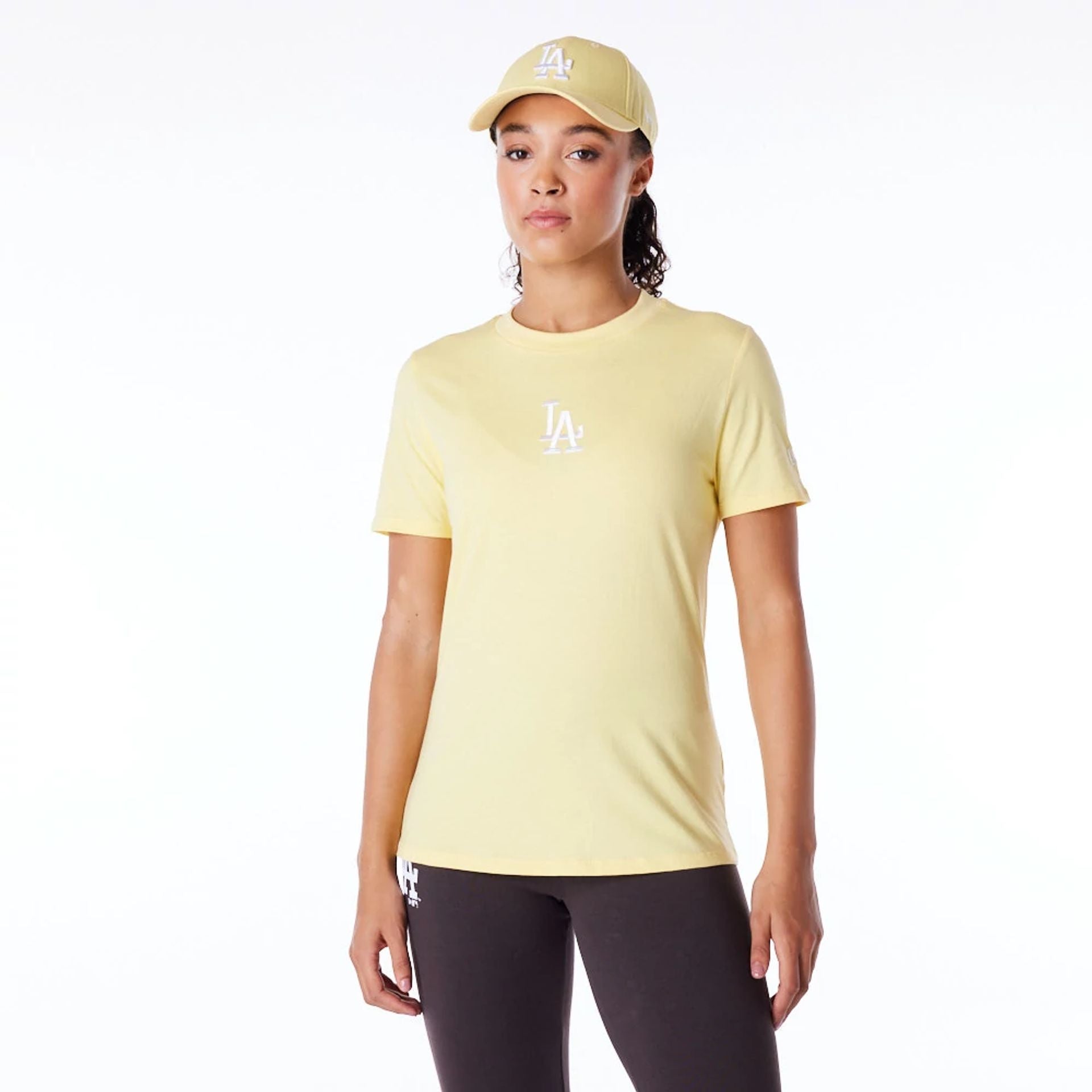 The Female model is wearing LA Dodgers Womens MLB League Essential Pastel Yellow T-Shirt 1