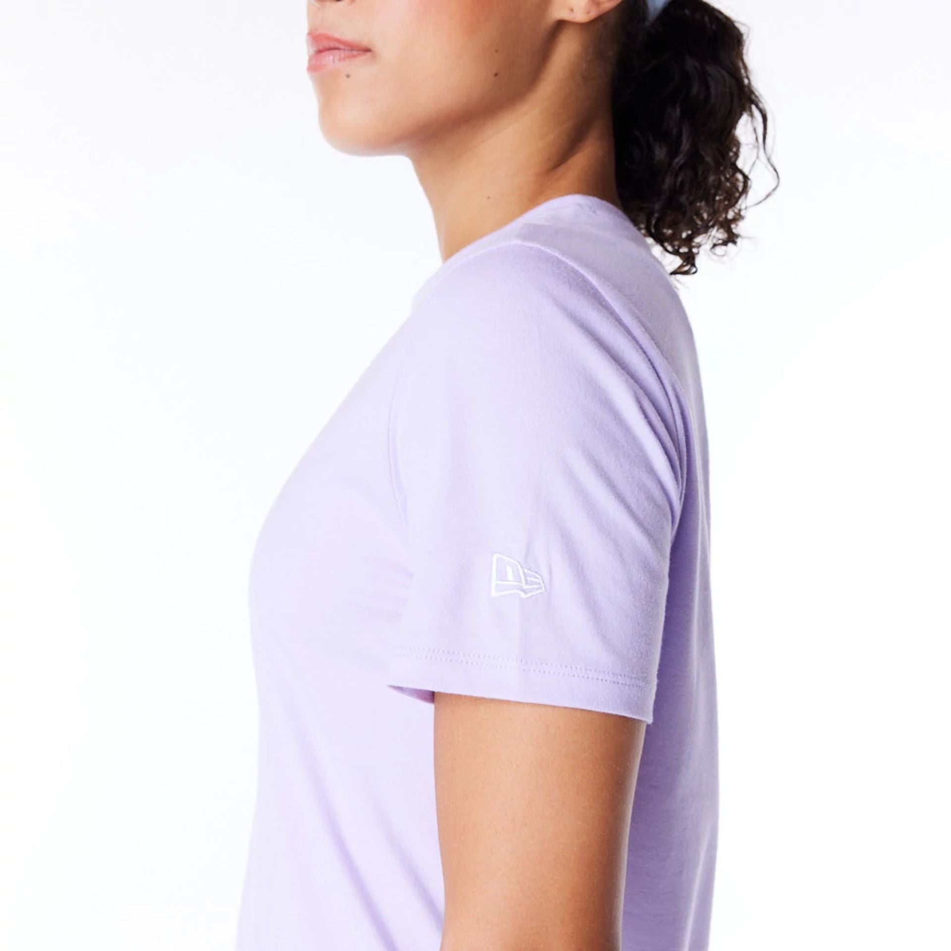 The Female model is wearing New York Yankees Womens MLB League Essential Pastel Purple T-Shirt 5