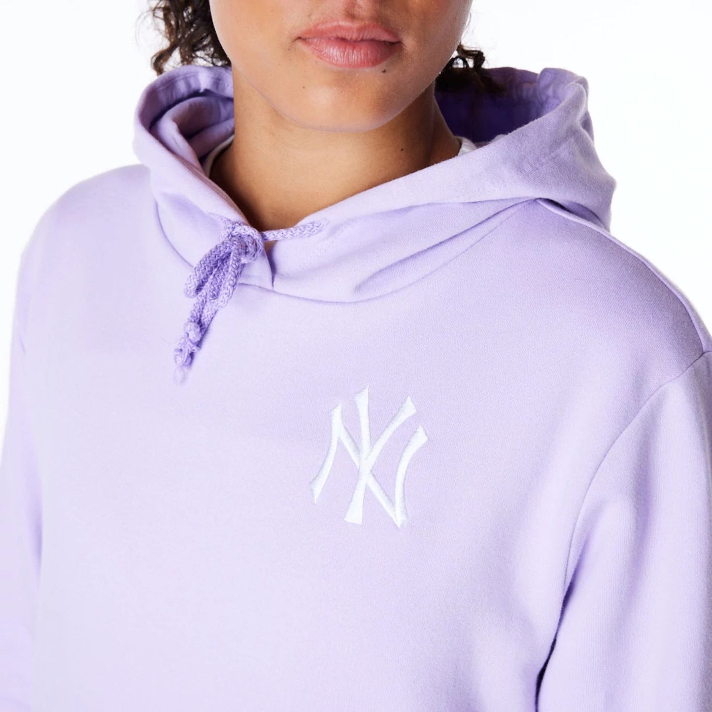 The Female model is wearing New York Yankees Womens MLB League Essential Pastel Purple Pullover Hoodie 2