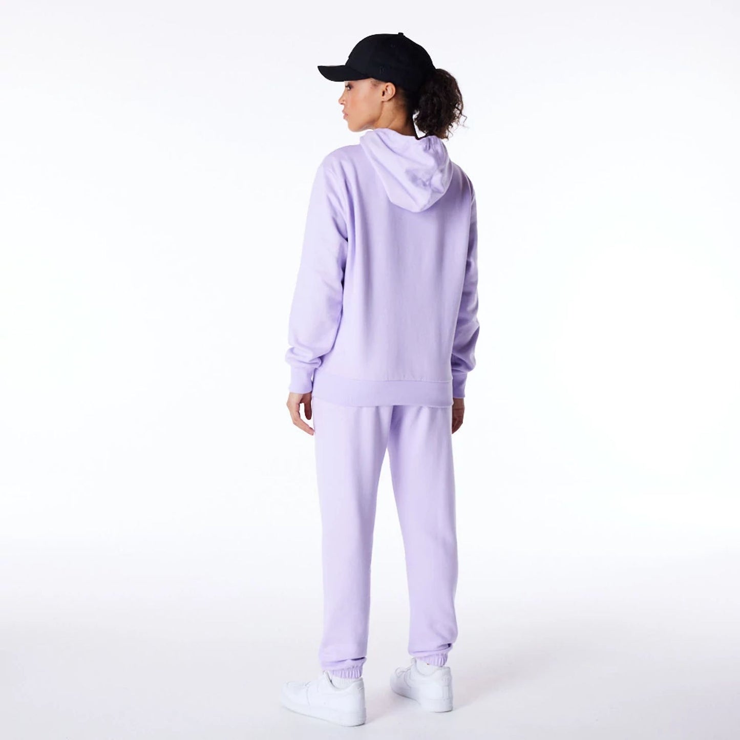 The Female model is wearing New York Yankees Womens MLB League Essential Pastel Purple Pullover Hoodie 4