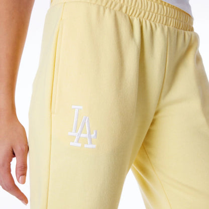 The Female model is wearing LA Dodgers Womens MLB League Essential Pastel Yellow Fleece Joggers 2