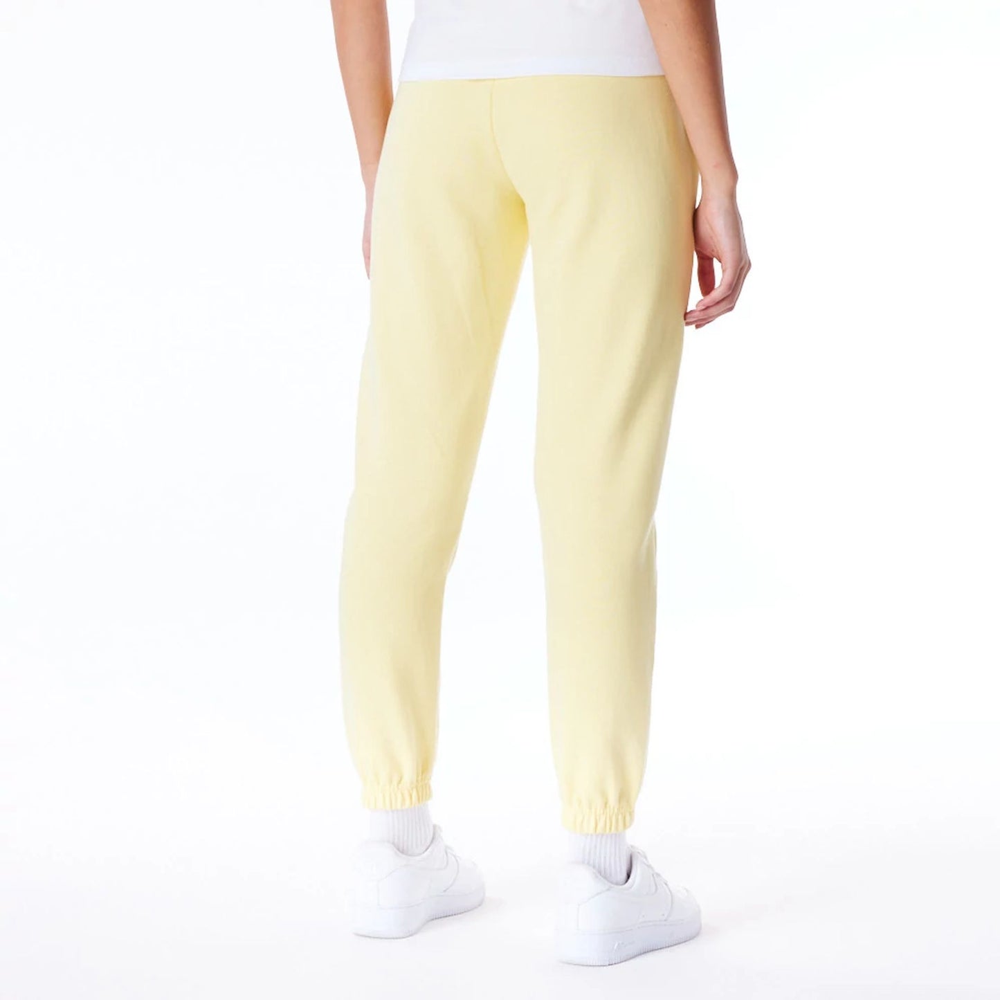 The Female model is wearing LA Dodgers Womens MLB League Essential Pastel Yellow Fleece Joggers 6