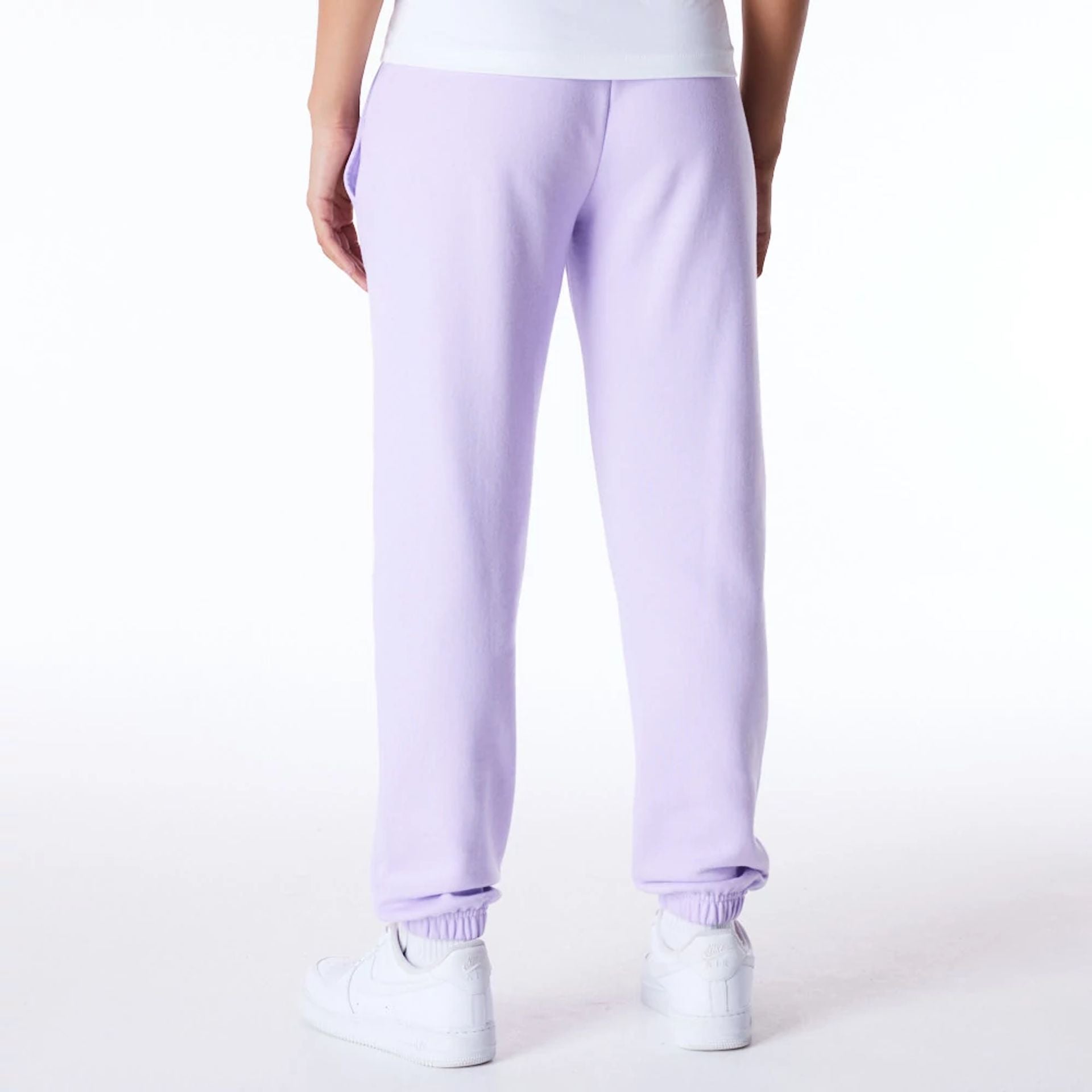 The Female model is wearing New York Yankees Womens MLB League Essential Pastel Purple Fleece Joggers 3