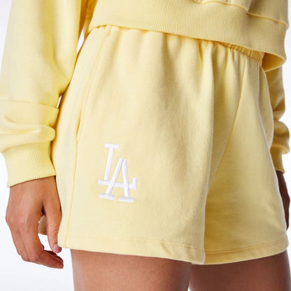 The Female model is wearing LA Dodgers Womens MLB League Essential Pastel Yellow Shorts 1