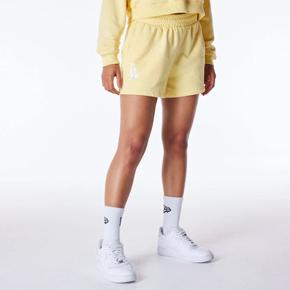 The Female model is wearing LA Dodgers Womens MLB League Essential Pastel Yellow Shorts 6