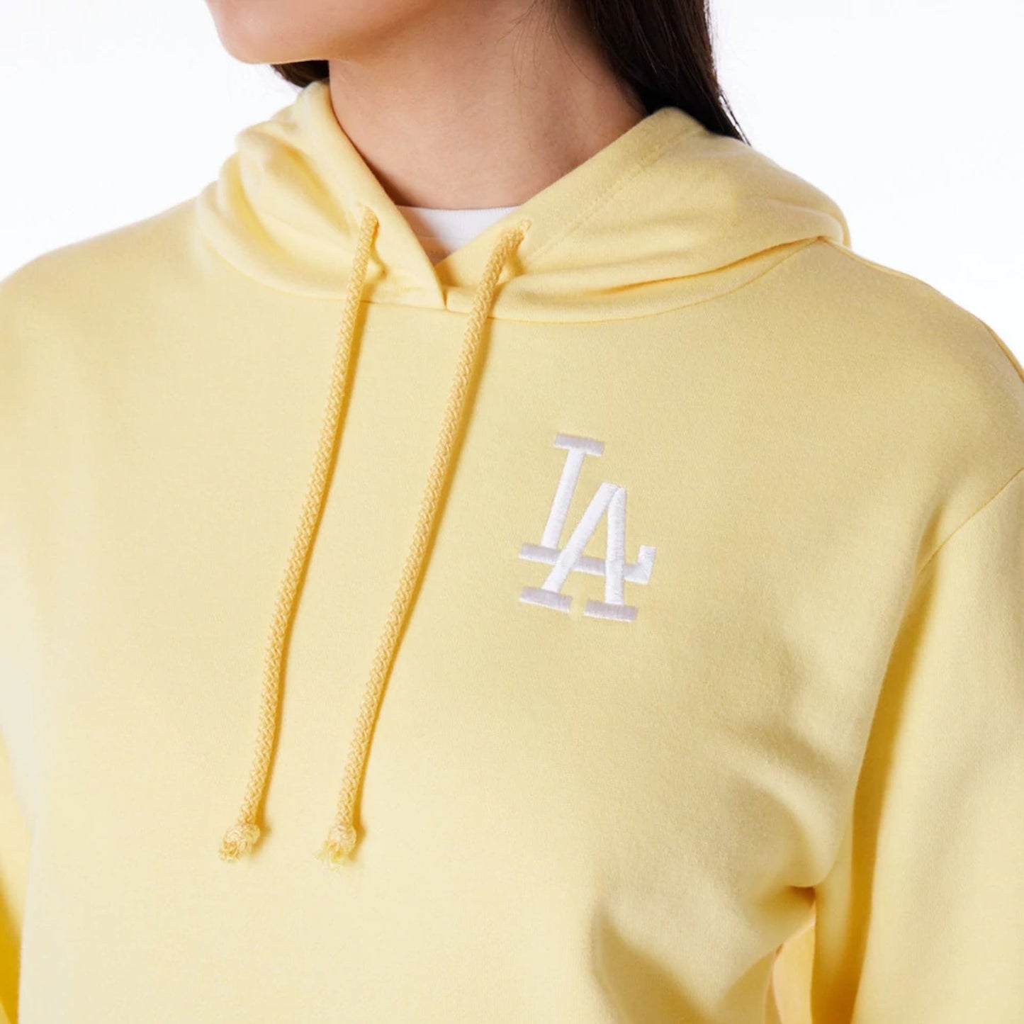 The Female model is wearing LA Dodgers Womens MLB League Essential Pastel Yellow Pullover Hoodie 7