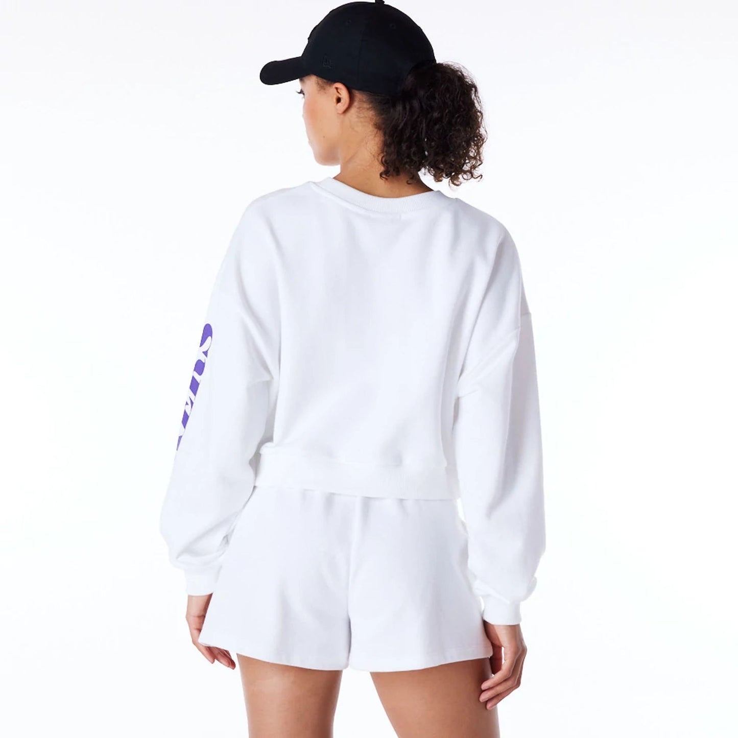 The Female model is wearing LA Lakers Womens NBA Wordmark White Crop Crew Neck Sweatshirt 6