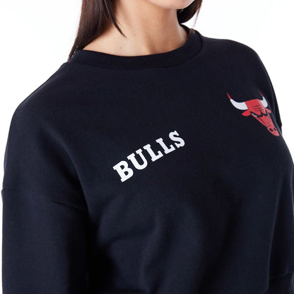 The Female model is wearing Chicago Bulls Womens NBA Wordmark Black Crop Crew Neck Sweatshirt 4