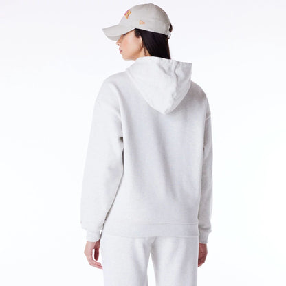 The Female model is wearing New Era Infill Grey Oversized Pullover Hoodie 6