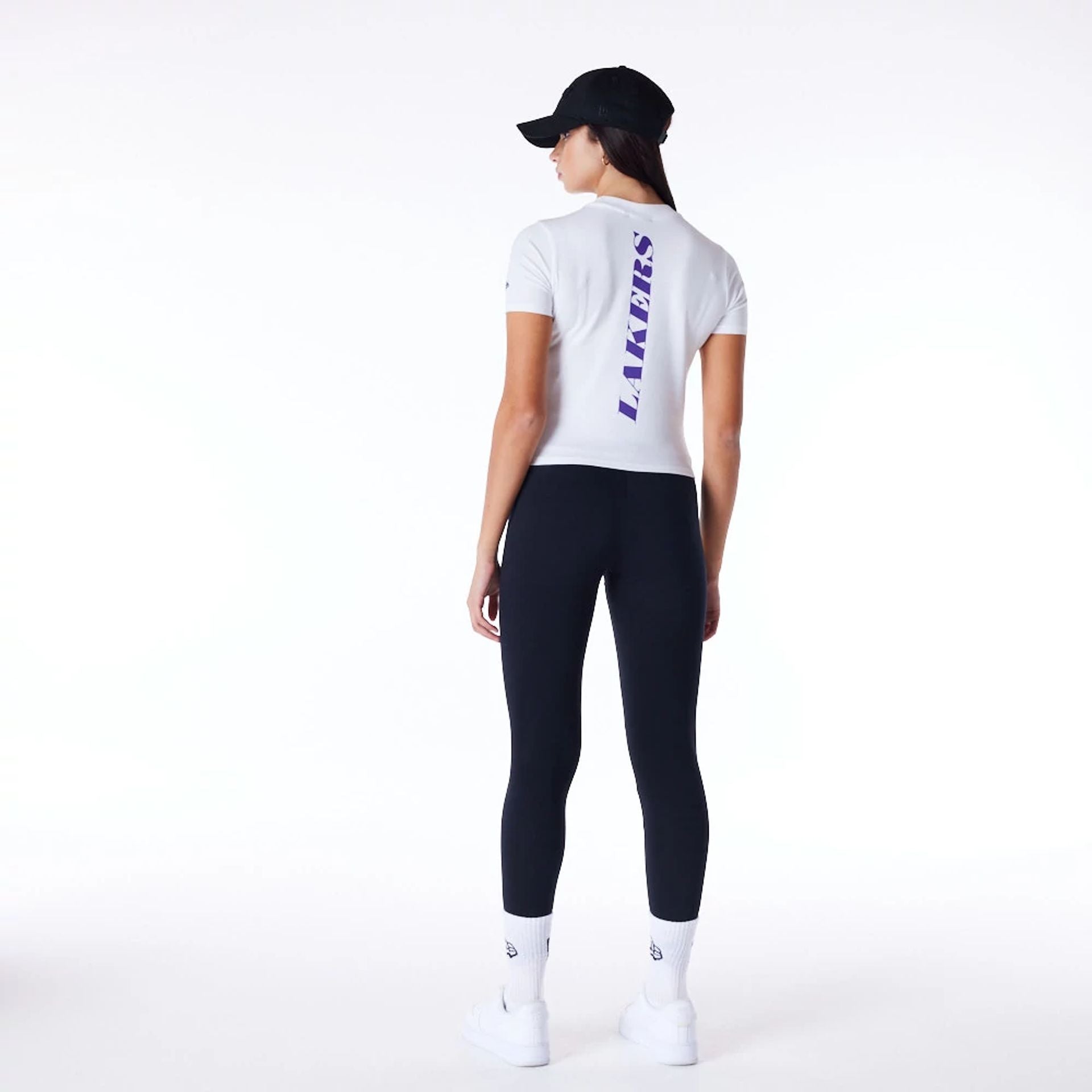 The Female model is wearing LA Lakers Womens NBA Wordmark White Slim T-Shirt 2