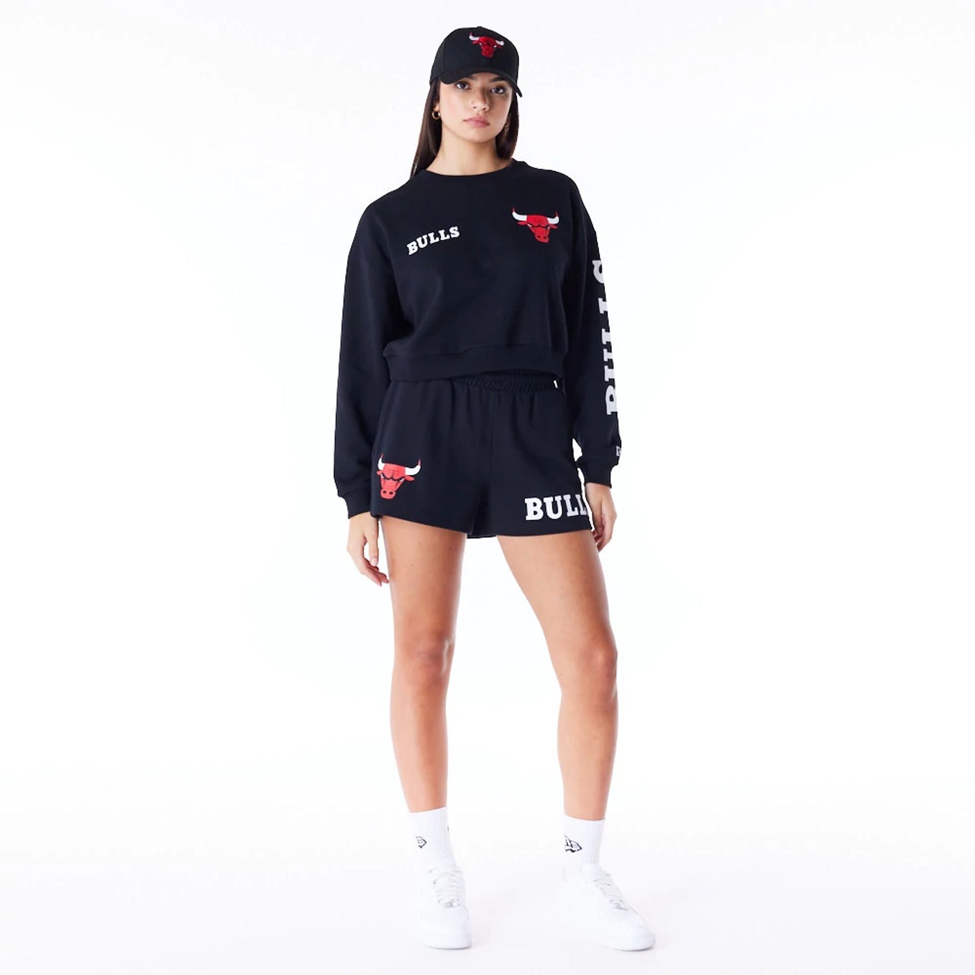 The Female model is wearing Chicago Bulls Womens NBA Wordmark Black Shorts 7