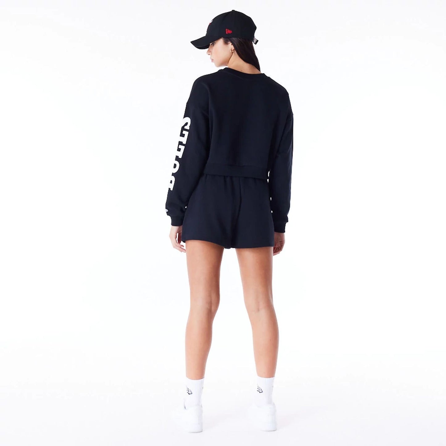 The Female model is wearing Chicago Bulls Womens NBA Wordmark Black Shorts 5