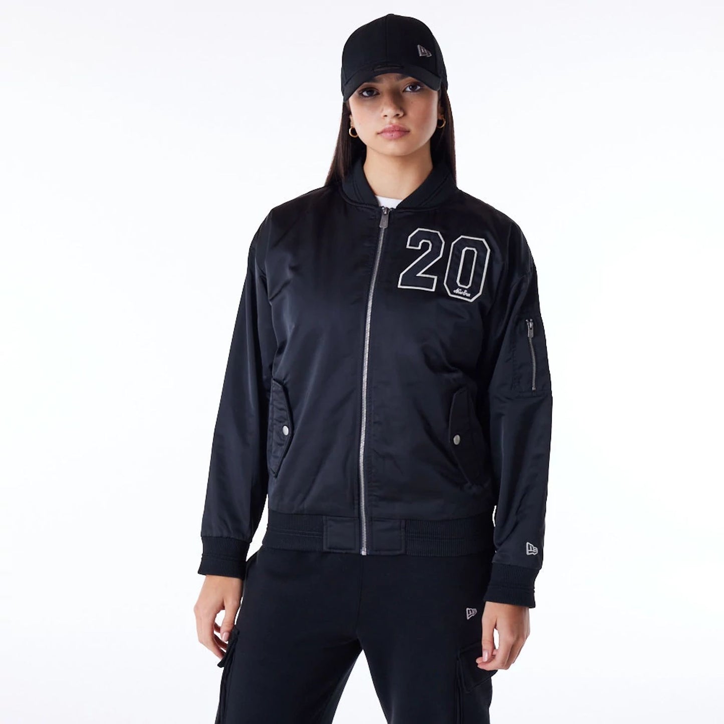 The Female model is wearing New Era Womens Black Bomber Jacket 9