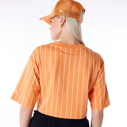 The Female model is wearing New Era Womens Pinstripe Orange Crop T-Shirt 6