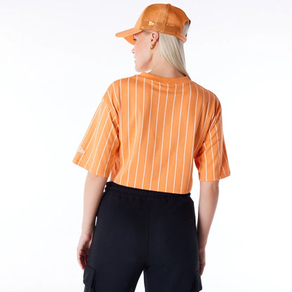 The Female model is wearing New Era Womens Pinstripe Orange Crop T-Shirt 7