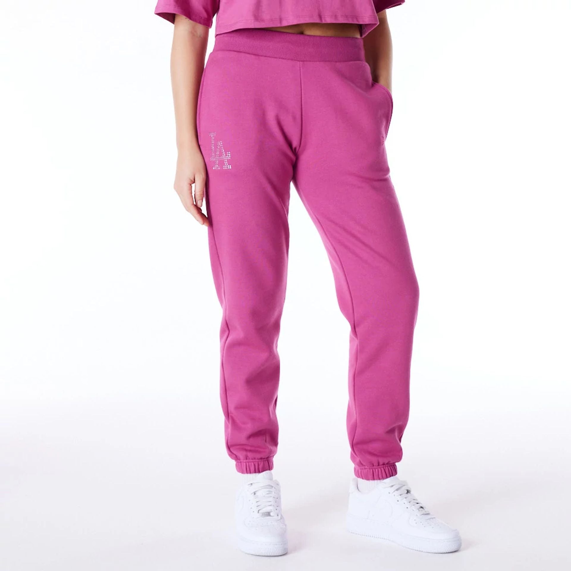 The Female model is wearing LA Dodgers Womens MLB Diamante Purple Fleece Joggers 2