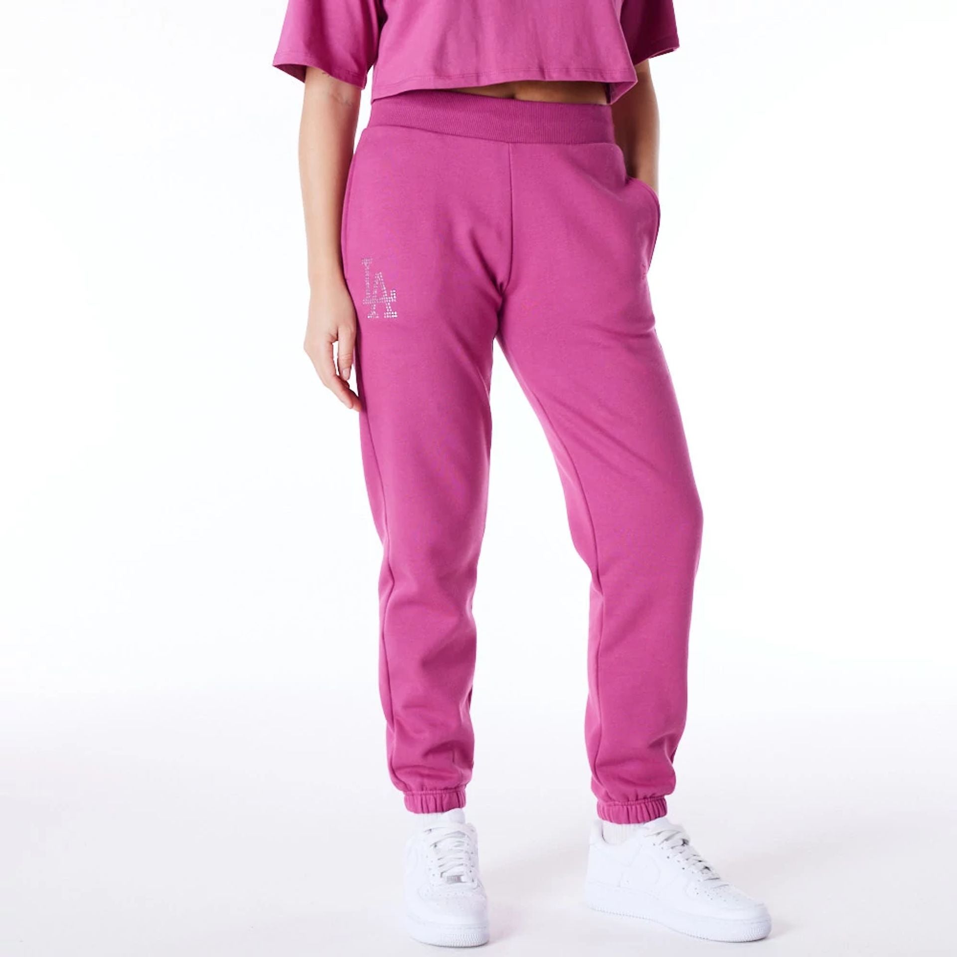 The Female model is wearing LA Dodgers Womens MLB Diamante Purple Fleece Joggers 7