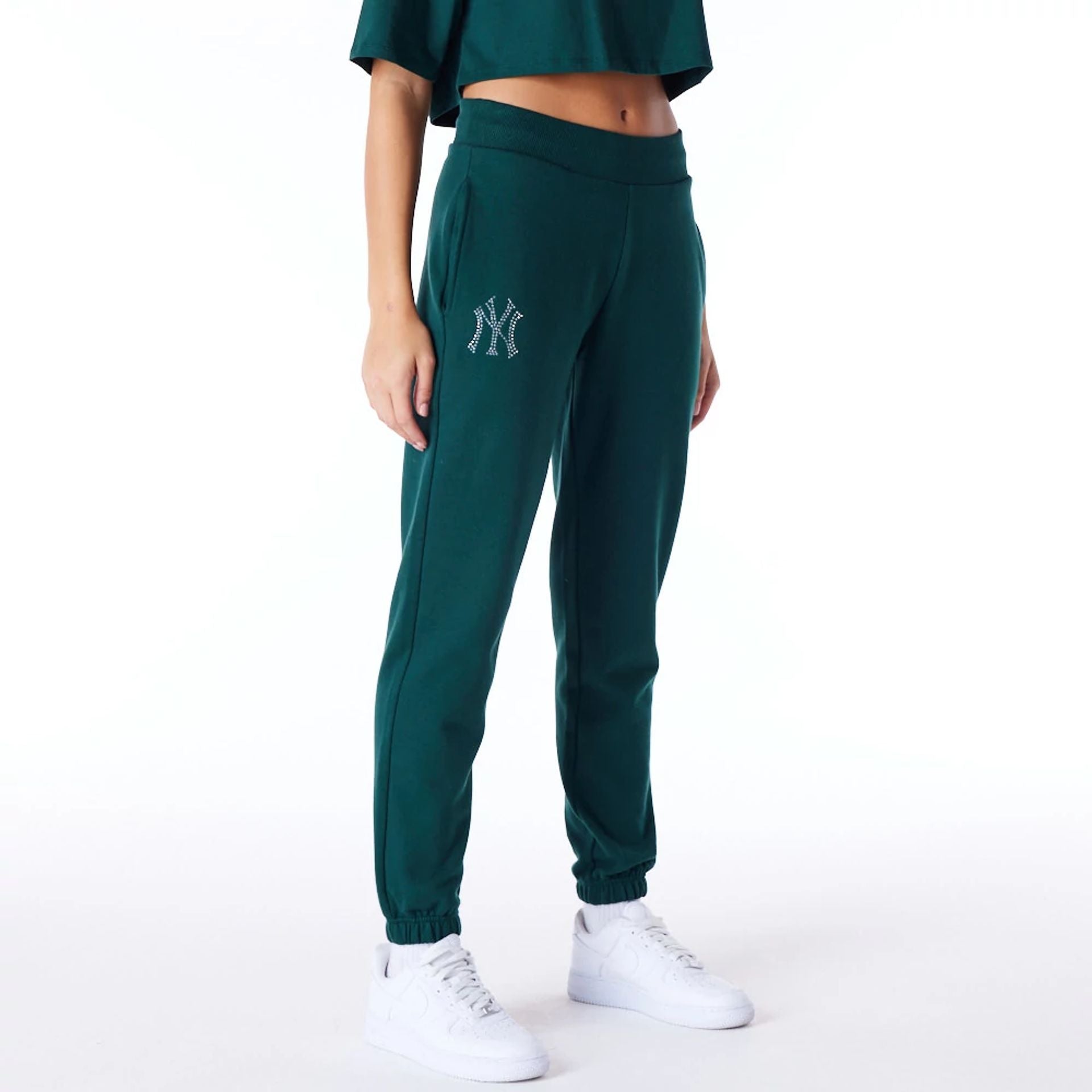 The Female model is wearing New York Yankees Womens MLB Diamante Dark Green Fleece Joggers 1