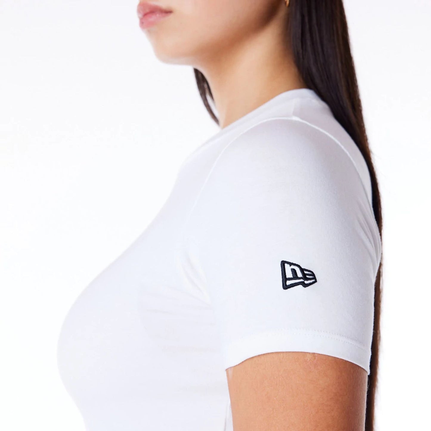 The Female model is wearing New Era Womens White Slim T-Shirt 3