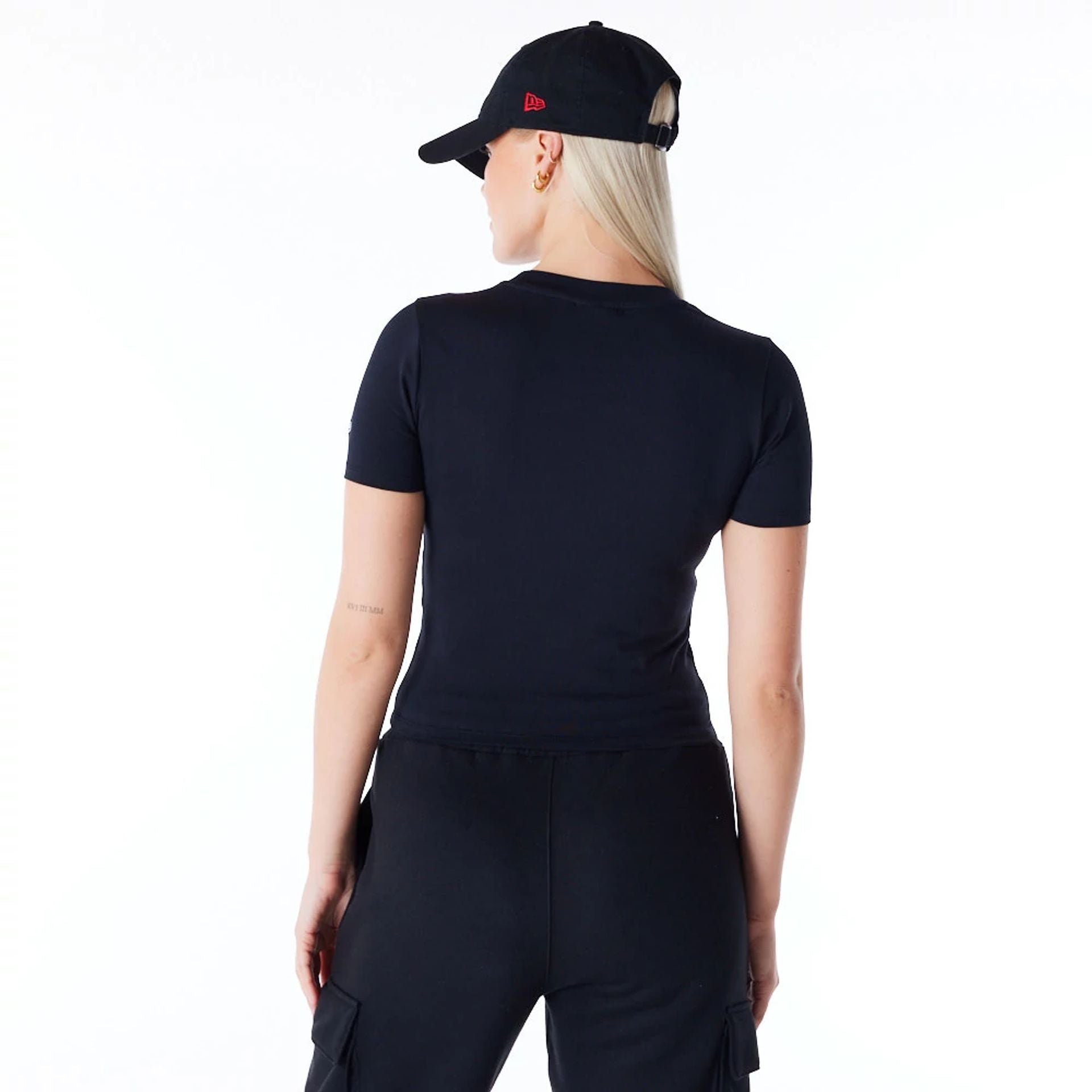 The Female model is wearing New Era Womens Black Slim T-Shirt 7