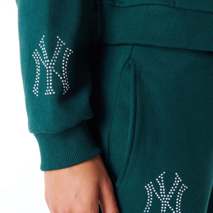 The Female model is wearing New York Yankees Womens MLB Diamante Dark Green Pullover Hoodie 4