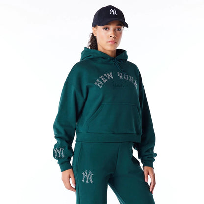 The Female model is wearing New York Yankees Womens MLB Diamante Dark Green Pullover Hoodie 1