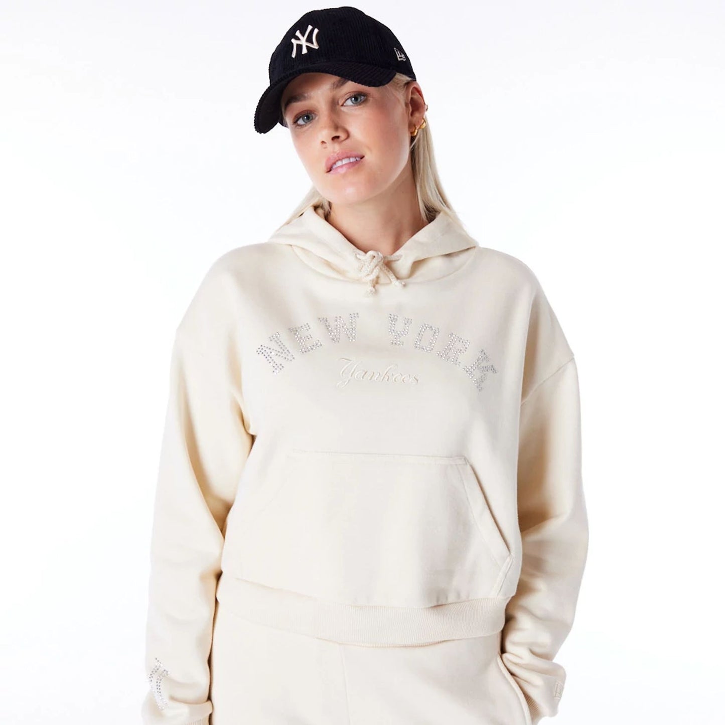 The Female model is wearing New York Yankees Womens MLB Diamante Stone Pullover Hoodie 1