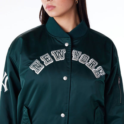 The Female model is wearing New York Yankees Womens MLB Dark Green Bomber Jacket 5