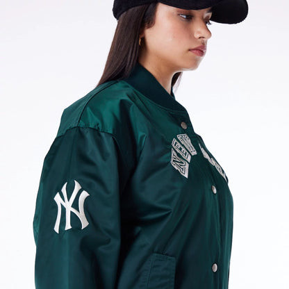 The Female model is wearing New York Yankees Womens MLB Dark Green Bomber Jacket 6