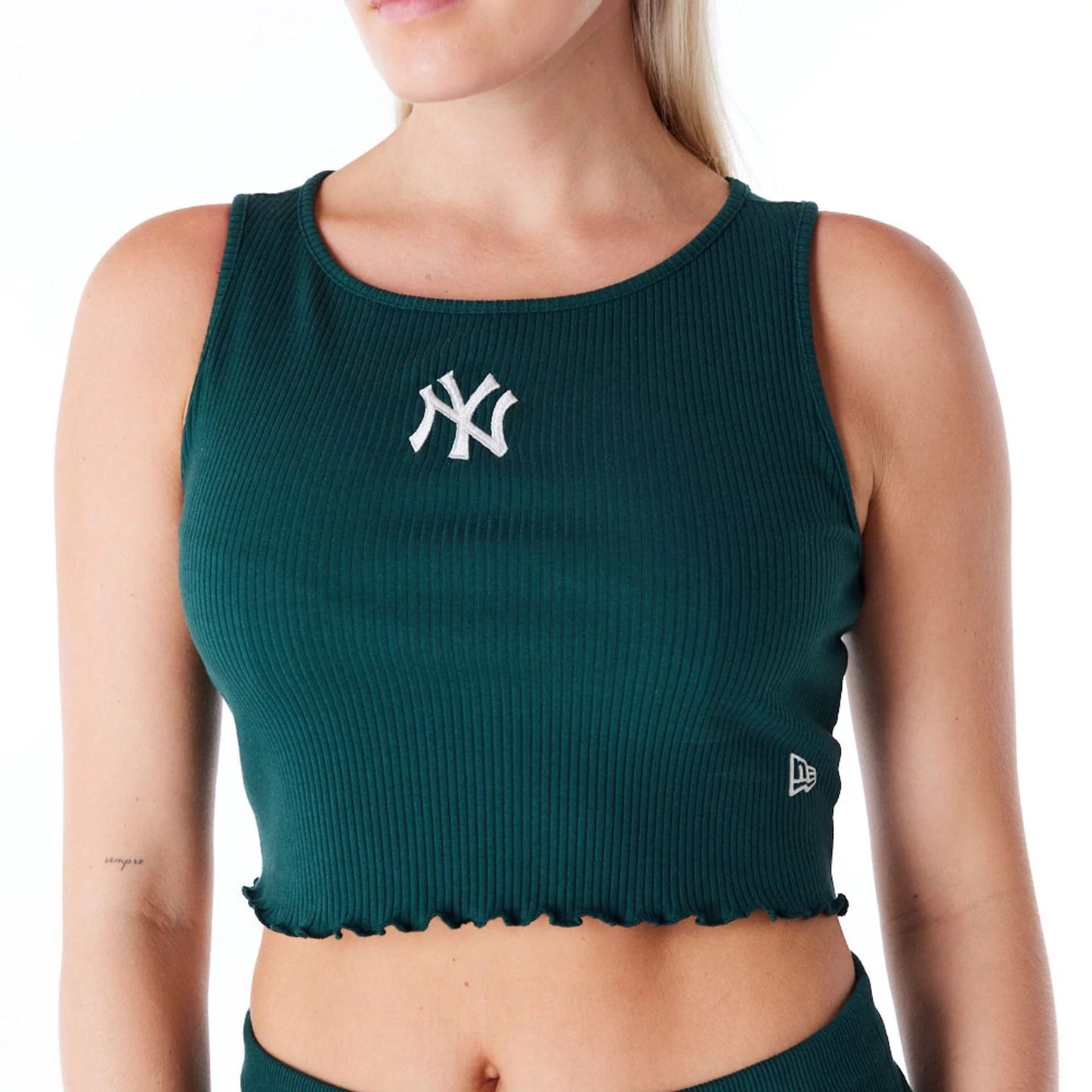 The Female model is wearing New York Yankees Womens MLB Rib Dark Green Crop Tank Top 3