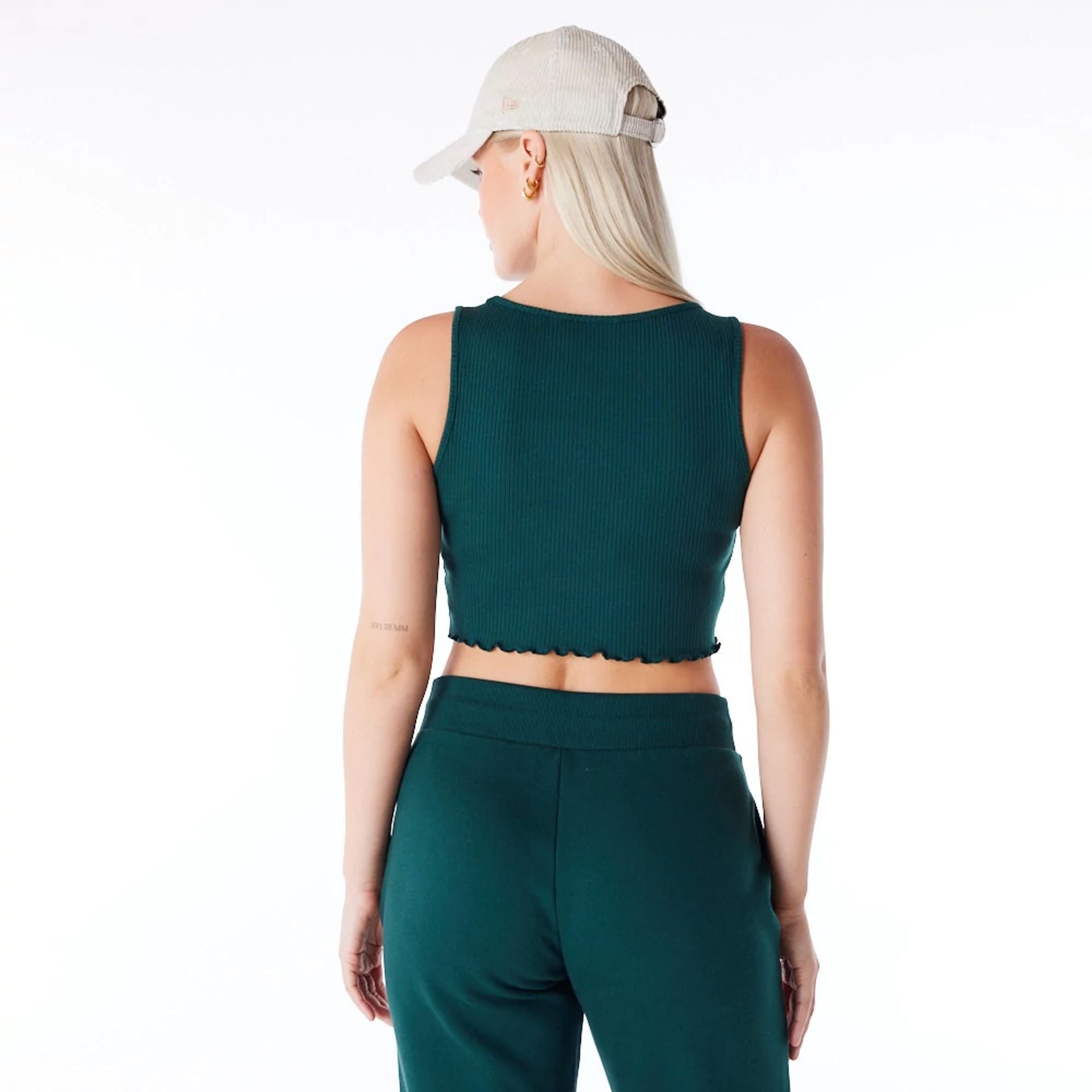 The Female model is wearing New York Yankees Womens MLB Rib Dark Green Crop Tank Top 2