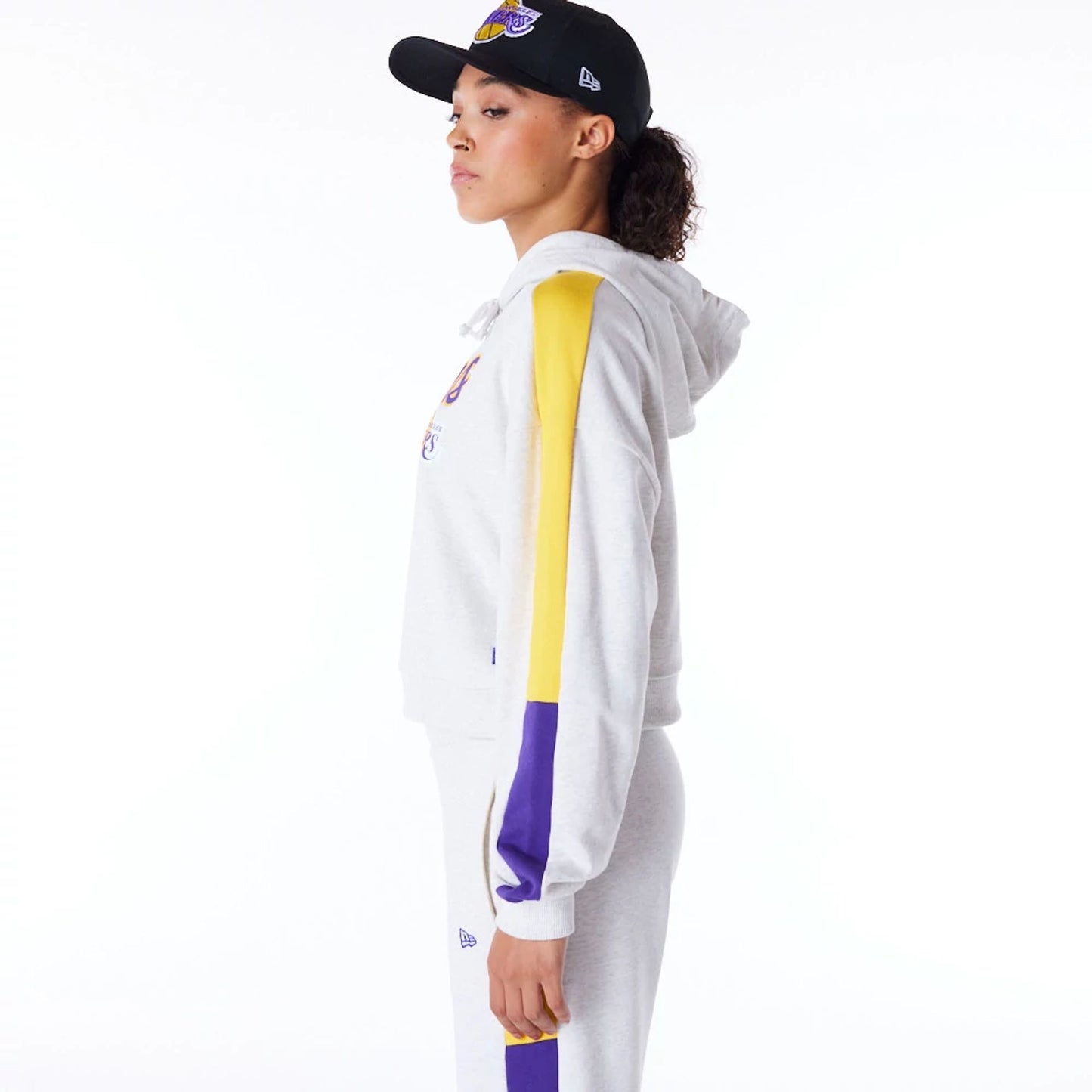 The Female model is wearing LA Lakers Womens NBA Colour Block Grey Pullover Hoodie 4